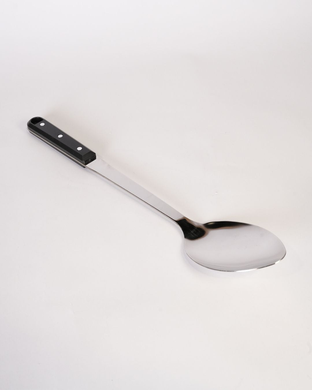 A long-handled metal serving spoon with a polished silver-toned bowl and handle, and a black plastic grip with three silver rivets,Stainless Steel Serving Spoon 14.5 Inch, Large Metal Buffet Serving Spoon, Commercial Catering Basting Spoon, Heavy Duty Riveted Handle Serving Utensil, Long Handle Chafing Dish Spoon, Industrial Hotel Banquet Serving Spoon, Professional Stainless Steel Food Spoon, Deep Bowl Buffet Spoon 2.8 Inch, Restaurant Quality Metal Serving Utensils, Durable Rice and Curry Serving Spoon