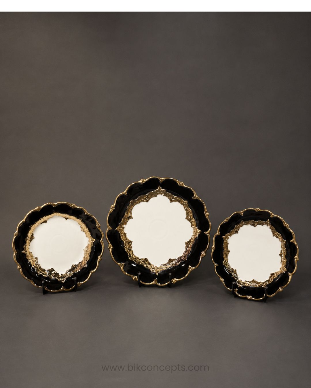A 28-piece dinner set for 6 people, featuring white ceramic plates and bowls with black scalloped rims and gold accents, 28 Piece Porcelain Dinnerware Set, Luxury Gold Plated Dinner Set, Black and Gold Crockery Set for 6, High End Porcelain Dish Set USA, Designer Scalloped Edge Dinnerware, Regal Baroque Gold Dinner Plates, Elegant Estate Dining Table Set, Luxury Wedding Registry Crockery, Gold Rimmed Soup Bowl Set, Fine Porcelain Oval Serving Platter