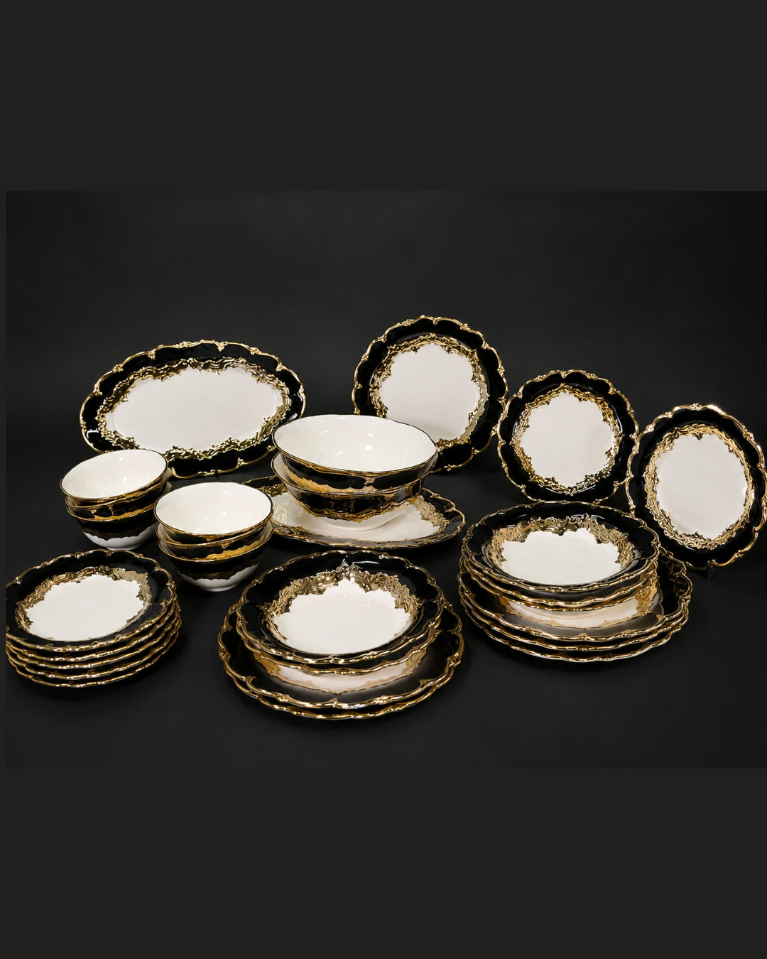 A collection of white ceramic dinnerware with ornate gold trim, including plates, bowls, and serving dishes,28 Piece Porcelain Dinnerware Set, Luxury Gold Plated Dinner Set, Black and Gold Crockery Set for 6, High End Porcelain Dish Set USA, Designer Scalloped Edge Dinnerware, Regal Baroque Gold Dinner Plates, Elegant Estate Dining Table Set, Luxury Wedding Registry Crockery, Gold Rimmed Soup Bowl Set, Fine Porcelain Oval Serving Platter