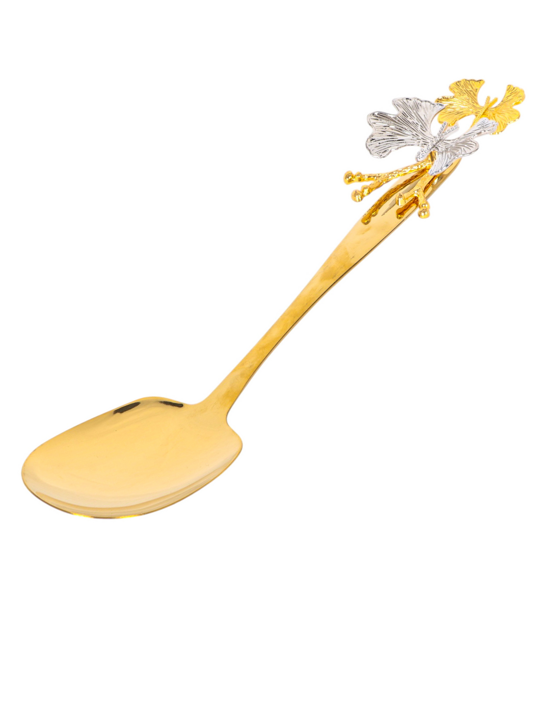 Close-up of butterfly design handle on gold and silver serving spoon