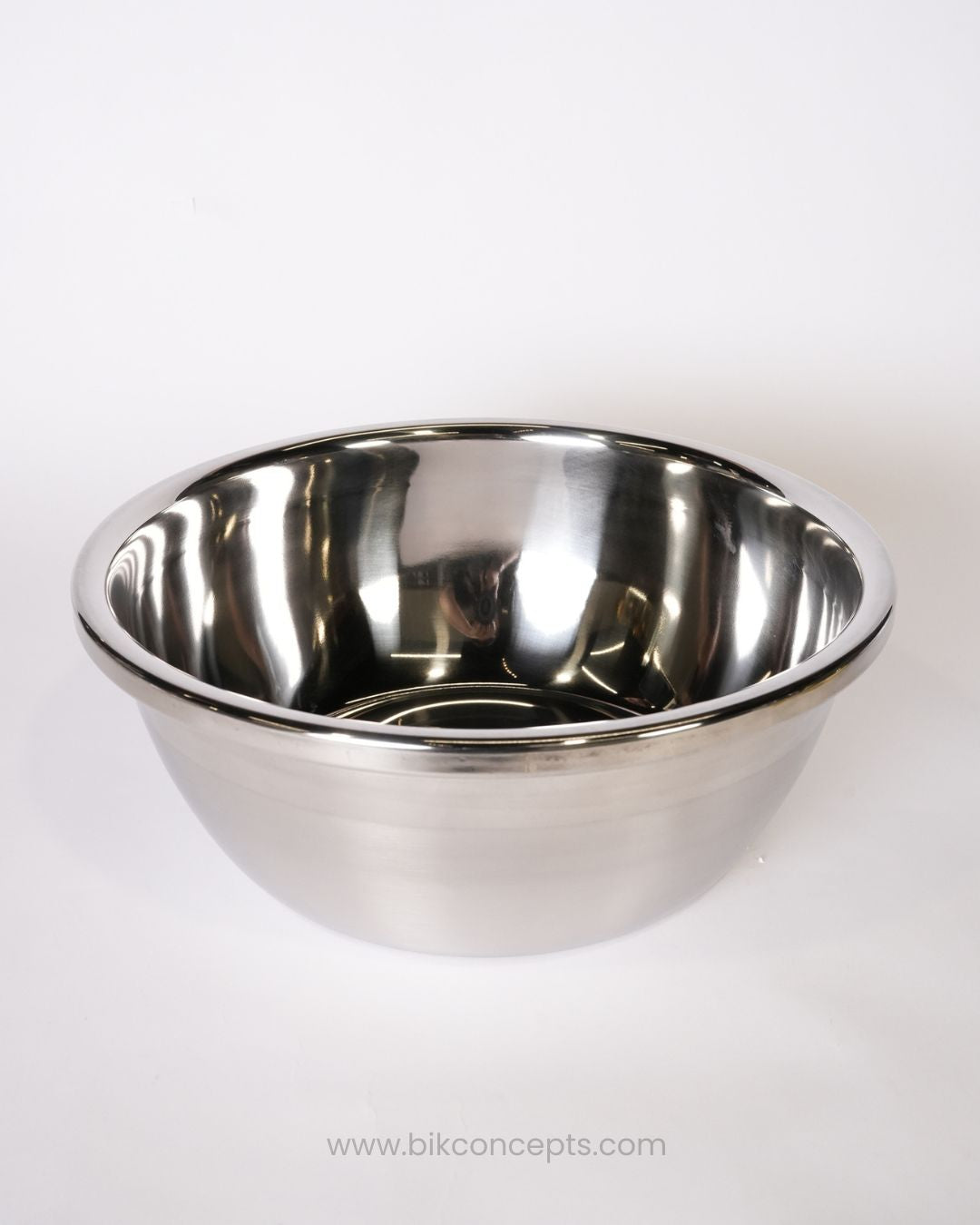 A stainless steel mixing bowl with a polished reflective interior and exterior, 8 Quart Stainless Steel Mixing Bowl, 12.5 Inch Commercial Prep Bowl, Large Stainless Steel Baking Bowl, Heavy Duty Metal Mixing Bowl 8 Qt, Deep Stainless Steel Salad Tossing Bowl, Hotel Kitchen Food Prep Bowl, Catering Large Capacity Mixing Bowl, Nesting Stainless Steel Kitchen Bowls, Industrial Stainless Steel Dough Bowl, Flat Bottom Metal Mixing Bowl 8 Qt