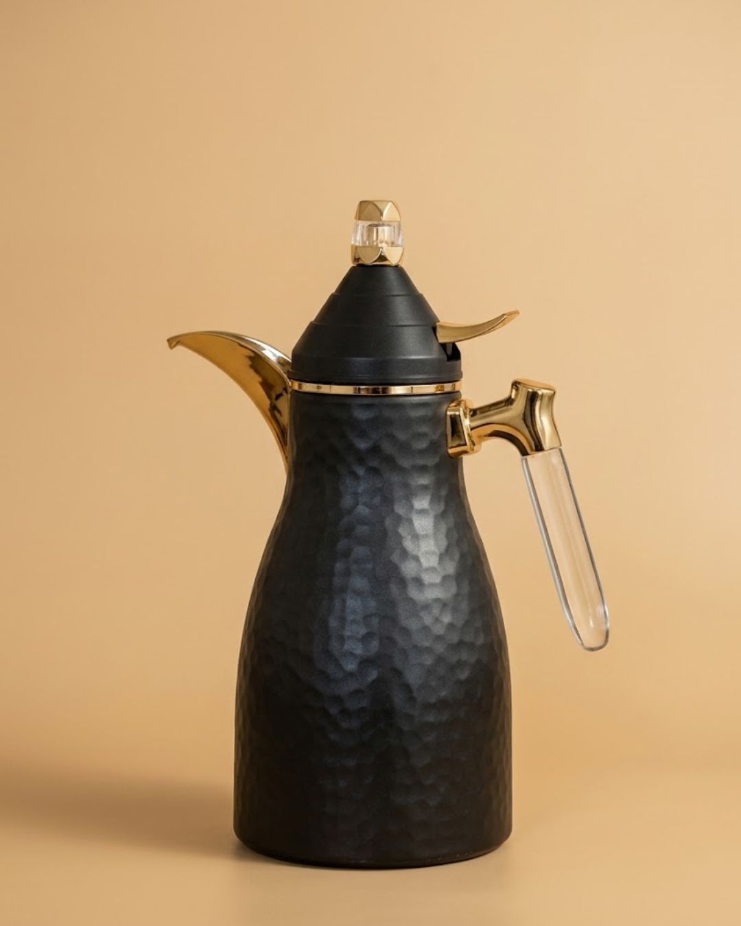 A black hammered metal coffee pot with gold-toned metal accents and a clear glass handle
Black Hammered Steel Coffee Thermos, 1 Liter Thermal Coffee Carafe, Black and Gold Vacuum Flask, Luxury Catering Coffee Dispenser, Decorative Black Tea Carafe, Dallah Style Coffee Server, Insulated Beverage Carafe for Weddings, Thermal Flask for Catering Events, High End Hot Water Thermos USA, Matte Black Vacuum Insulated Pitcher