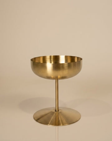 A modern brass pedestal bowl with a wide circular base and a single central stem, shown on a neutral beige background.

Gold Stainless Steel Dessert Bowl, Tall Stemmed Ice Cream Cup, Gold Coupe Dessert Goblet, Metal Sorbet Dish, Individual Catering Dessert Cup, Brushed Gold Stemmed Serving Bowl, Modern Gold Stainless Steel Dessertware, Shatterproof Catering Dessert Ware USA, Commercial Ice Cream Goblet, Small Gold Mousse Cup