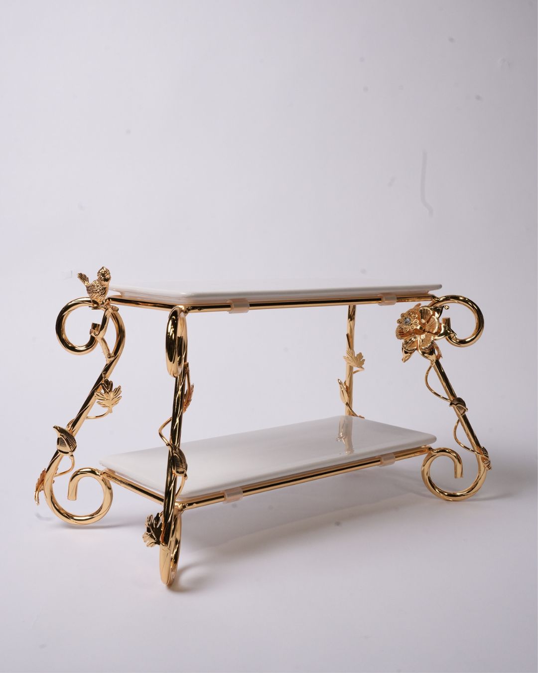 Gold 2 Tier Serving Stand, Two Tier Ceramic Dessert Stand, High End Catering Dessert Tray, Botanical Bird Food Stand, Rectangular Ceramic Serving Rack, Luxury Party Dessert Display, Gold Metal Tiered Pastry Stand, Upscale Wedding Dessert Tower, Designer Buffet Serving Rack, Double Layer Macaron Stand