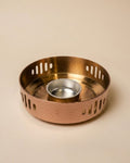 A hammered copper candle holder with a slotted outer rim and a small central silver cup, photographed on a plain beige background.

Rose Gold Buffet Server with Burner, Triply Stainless Steel Chafing Dish, Hammered Copper Food Warmer Dish, Round Buffet Chafing Server, Luxury Food Warmer for Parties, Stainless Steel Hot Pot Server, Decorative Rose Gold Serving Dish with Lid, Main Course Food Warmer with Fuel Holder, High End Buffet Server USA, Premium Triply Party Chafing Dish