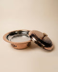 A hammered copper lidded casserole dish with a textured silver interior, shown with its lid resting beside the base on a warm beige background.

Rose Gold Buffet Server with Burner, Triply Stainless Steel Chafing Dish, Hammered Copper Food Warmer Dish, Round Buffet Chafing Server, Luxury Food Warmer for Parties, Stainless Steel Hot Pot Server, Decorative Rose Gold Serving Dish with Lid, Main Course Food Warmer with Fuel Holder, High End Buffet Server USA, Premium Triply Party Chafing Dish