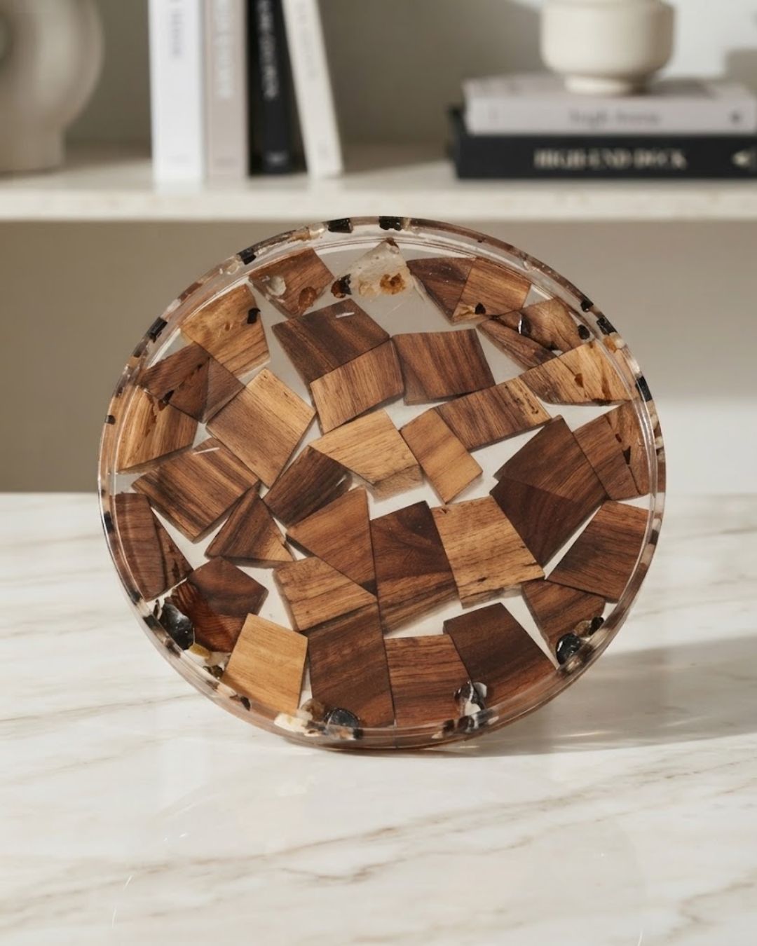 A round decorative resin tray featuring a mosaic pattern of various wood slices in shades of brown, Wood and Epoxy Resin Serving Tray, Handcrafted Round Wood Tray, Mosaic Timber Resin Platter, Nature Enthusiast Home Decor, Clear Resin Charcuterie Board, Organic Wood Coffee Table Tray, Artisan Resin Serving Platter, Rustic Modern Wood Accent Tray, Clear Resin Drink Tray, Eco Friendly Natural Wood Serving Board