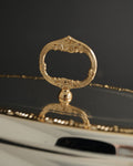 ornate serving platter, gold accent serving dish, silver serving platter, gold serving platter, luxury entertaining tableware, elegant food presentation, holiday serving platter, dinner party serving dish, formal dinner serving platter, serving platter for roasts, serving platter for rice, serving platter for whole fish, luxury centerpiece serving dish, high end serving ware, premium entertaining dish, 23 inch oval serving dish, BIK Concepts serving dish
