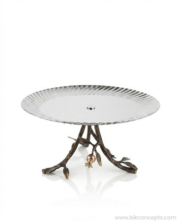 A round pedestal table featuring a silver-toned scalloped metal top and a dark bronze branch-like base with leaf and flower details, Single Tier Stainless Steel Platter, Luxury Pomegranate Cake Stand, High End Pedestal Dessert Server, Botanical Metal Riser for Catering, Fluted Silver Serving Platter, Premium Catering Food Risers USA, 12 Inch Tiered Hors D'oeuvres Display, Luxury Charcuterie Pedestal, Designer Tabletop Servingware, Antique Gold and Silver Cake Riser