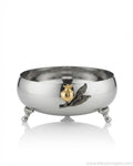 A polished silver footed bowl with a gold and silver pomegranate and leaf motif on the front, 9 Inch Stainless Steel Footed Bowl, Luxury Pomegranate Centerpiece Bowl, High End Decor Bowl for Home, Botanical Metal Server for Catering, Silver Footed Serving Basin, Premium Catering Food Presentation USA, Designer Tabletop Centerpiece Vessel, Antique Gold and Silver Fruit Bowl, Luxury Wedding Tableware, Decorative Metal Bowl for Console