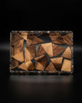 A rectangular tray with a mosaic pattern of irregular wooden triangles in various shades of brown, set in a clear resin frame, Wood and Epoxy Resin Serving Tray, Rectangular Resin Serving Platter, Geometric Wood Mosaic Tray, Nature Enthusiast Home Decor, Clear Epoxy Charcuterie Board, Natural Timber Accent Tray, Organic Wood Coffee Table Tray, Artisan Resin Drink Tray, Rectangular Wood Serving Board, Biophilic Home Accessories