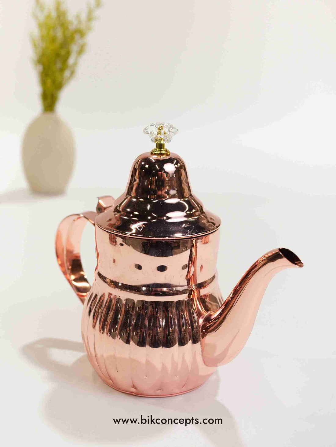 Rose gold teapot, fluted stainless steel kettle, jewel lid teapot, 1.2L luxury server, rose gold tea service, elegant Moroccan style teapot, crystal top tea kettle, festive table decor.