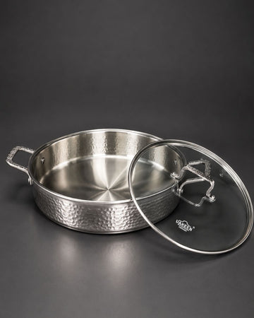 A hammered stainless steel pot with side handles and a matching glass lid, Hammered Stainless Steel Shallow Casserole, Silver Braiser Pan with Glass Lid, Luxury Stainless Steel Chef Pan, Designer 5 Quart Shallow Casserole, High End Gourmet Buffet Serving Pan USA, Decorative Hammered Stainless Steel Cookware, Large Diameter Braising Pot, Professional Grade Stainless Skillet Pan, Estate Kitchenware Serveware, 3.5 Quart Shallow Casserole Dish