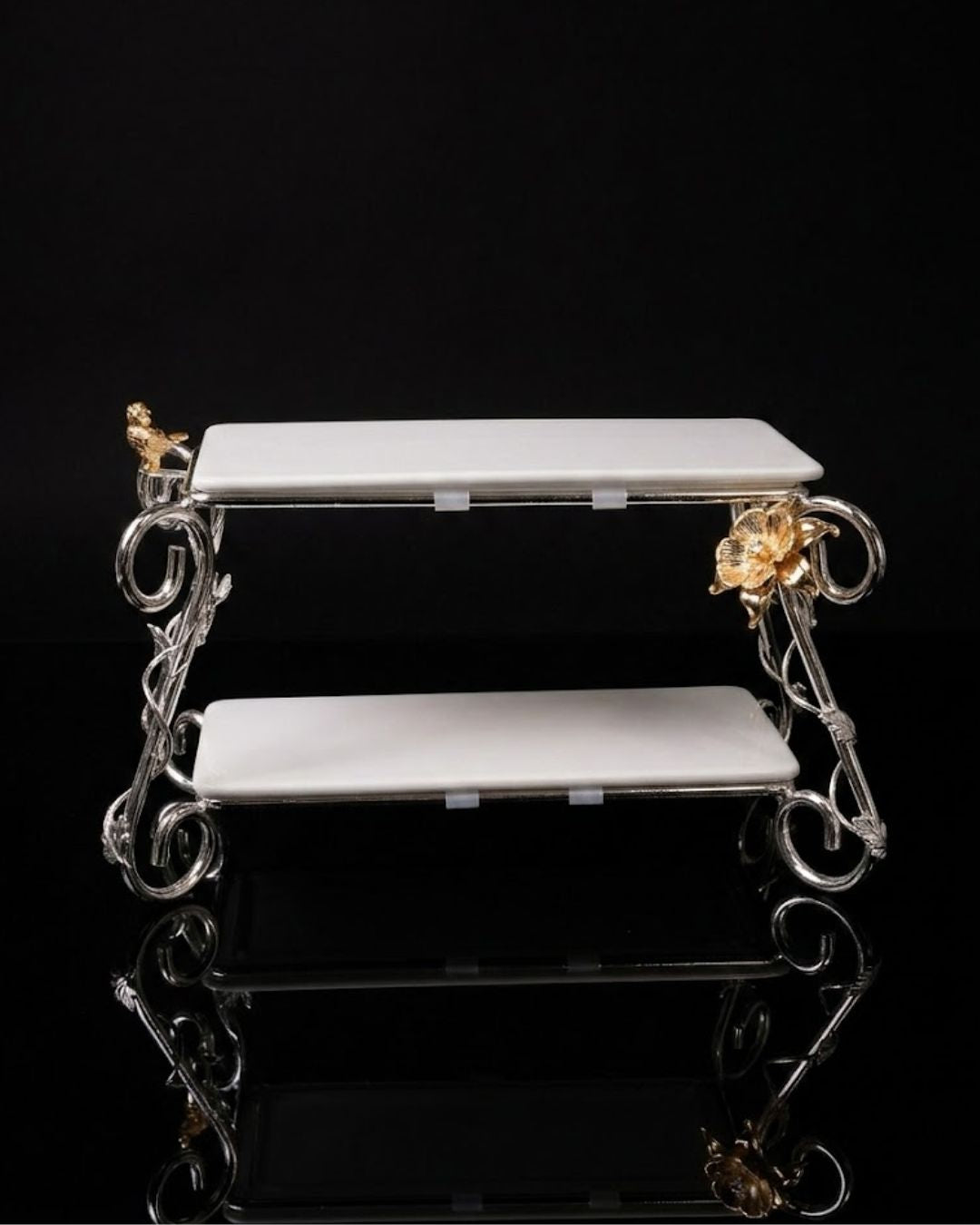 A two-tiered serving stand with white marble shelves and ornate silver metal scrollwork, accented with gold-tone decorative elements on a black reflective background.

Silver 2 Tier Serving Stand, Two Tier Ceramic Dessert Stand, High End Catering Dessert Tray, Botanical Bird Food Stand, Rectangular Ceramic Serving Rack, Luxury Party Dessert Display, Silver Metal Tiered Pastry Stand, Upscale Wedding Dessert Tower, Two Tone Buffet Serving Rack, Double Layer Macaron Stand, Gold and Silver Tiered Tray