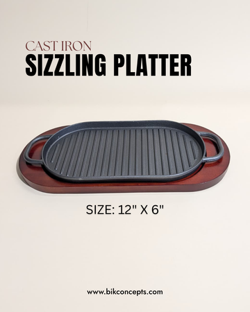 12 inch sizzling platter, cast iron oval steak plate, bamboo wood base server, restaurant fajita pan, cast iron serving tray, sizzling sisig plate, professional steakhouse platter.