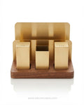 A modern three-compartment salt and pepper shaker set with brushed gold-finished metal containers, Brushed Gold Seasoning Set with Napkin Holder, Stainless Steel Salt Pepper Shaker Napkin Organizer, Commercial Hotel Tabletop Caddy Set, Luxury Catering Salt and Pepper Set with Tissue Holder, Gold Tabletop Condiment Caddy with Wooden Base, Modern Hotel Restaurant Table Organizer, Gold Spice Shaker Set with Toothpick Holder, Compact Tabletop Caddy 5.5 x 3.8 Inch, Decorative Gold Stainless Steel Condiment Holde
