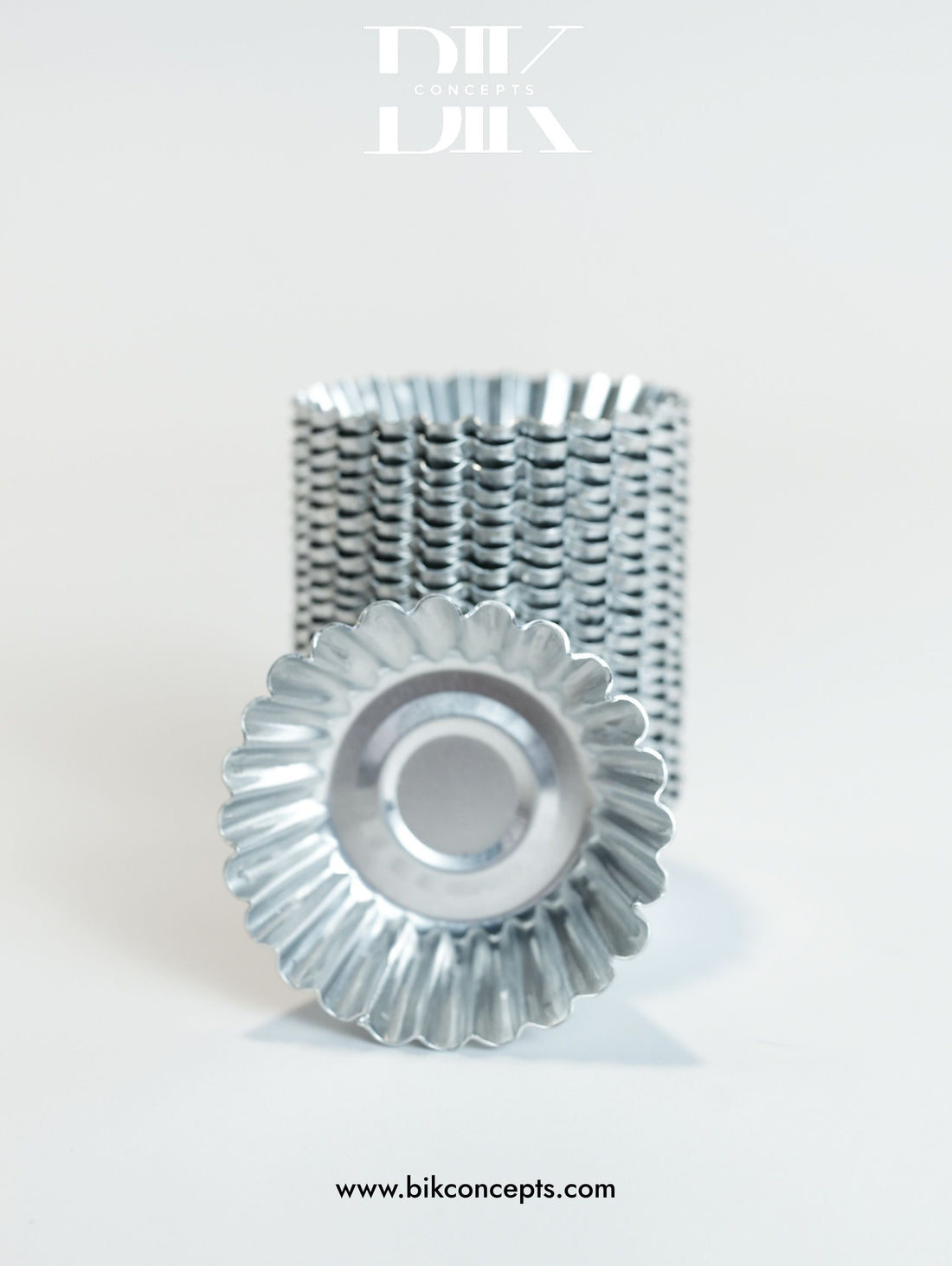 Mini tart molds, aluminum tart pans, fluted baking cups, individual quiche pans.