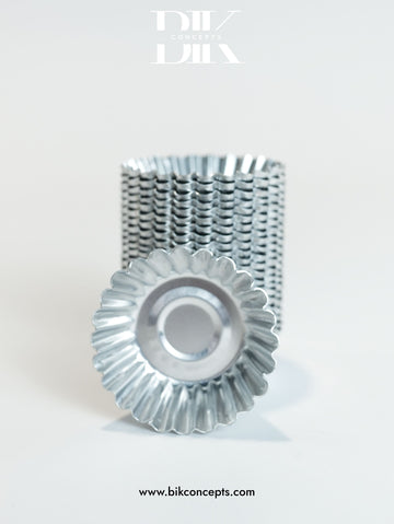 Mini tart molds, aluminum tart pans, fluted baking cups, individual quiche pans.