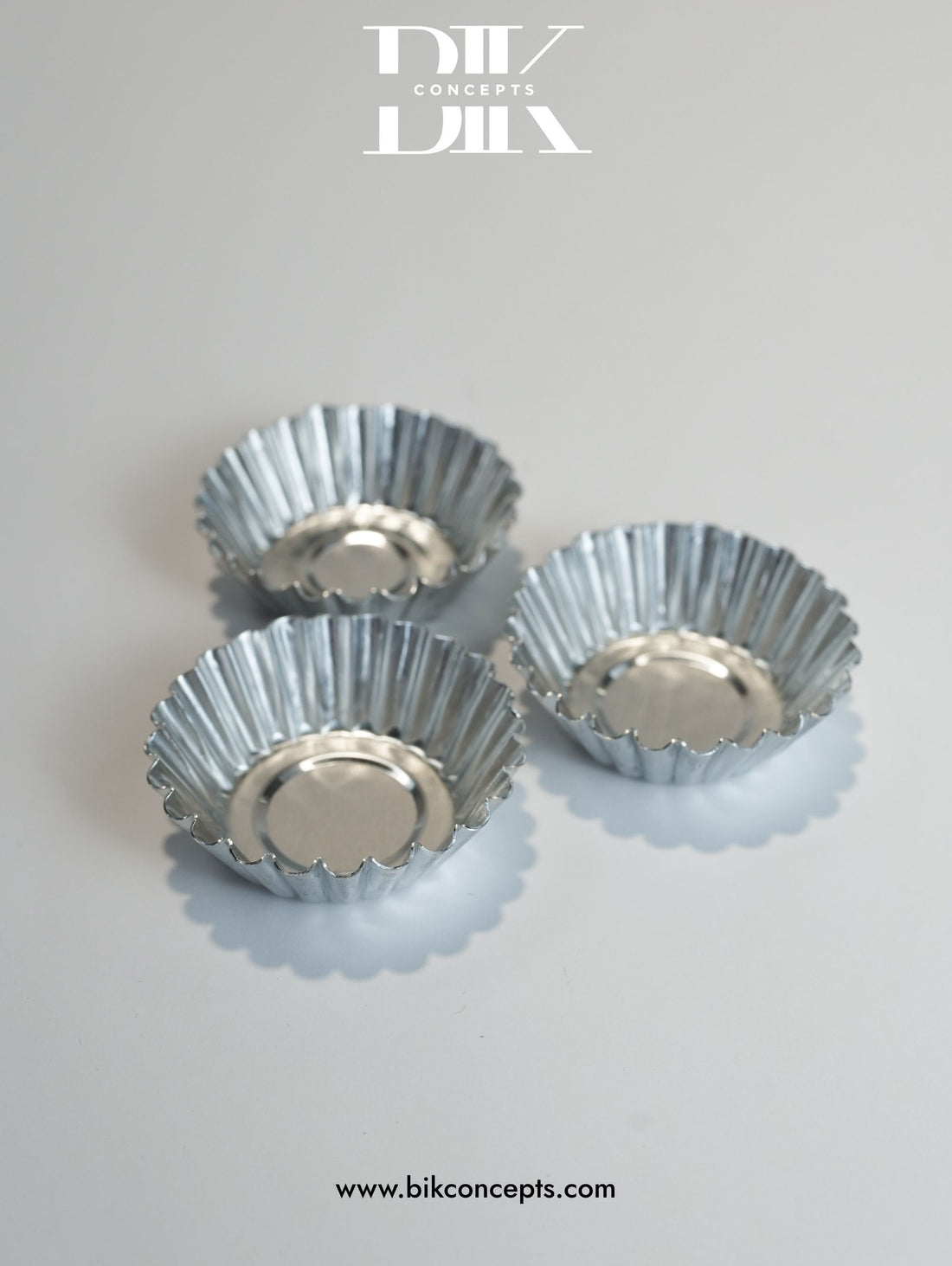 Mini tart molds, aluminum tart pans, fluted baking cups, individual quiche pans.
