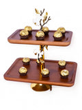 2 Tier Serving Tray, Wooden Platter with Gold Stand, Luxury Buffet Server, Orchid Decor Tableware, Tiered Dessert Stand, Appetizer Display Set, Modern Farmhouse Platter, Gold Branch Serving Tray, Decorative Food Display, Afternoon Tea Stand, Rectangular Tiered Tray, Upscale Entertaining Essentials, Elegant Centerpiece Platter, Solid Wood Serving Trays, Gourmet Food Presentation, Wedding Gift Platter, Housewarming Gift Idea, Rustic Gold Table Decor, Two Layer Serving Board, Boutique Hospitality Supplies