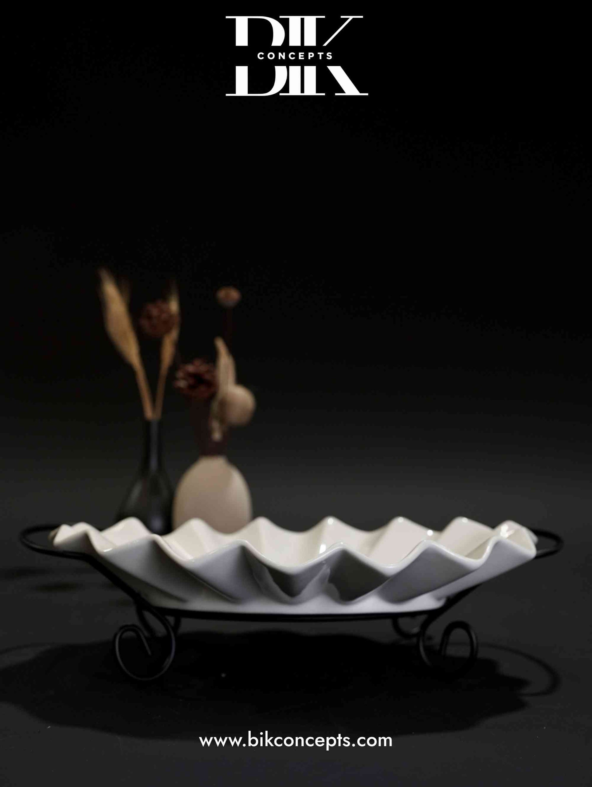 elegant pedestal server, large porcelain platter, designer dinnerware.