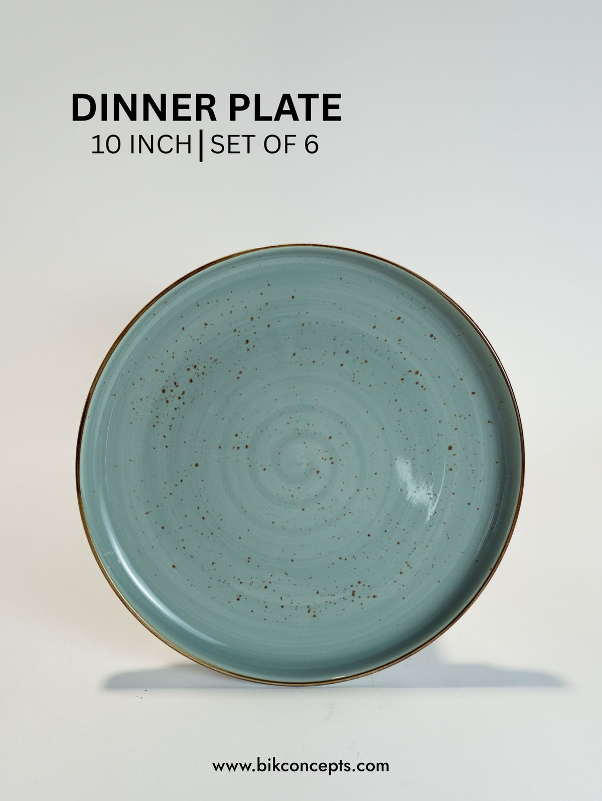 10-inch light green dinner plate with speckled design on a light gray background, featuring the brand 'Bik Concepts'.