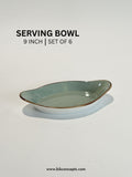 9-inch green serving bowl with speckled design
